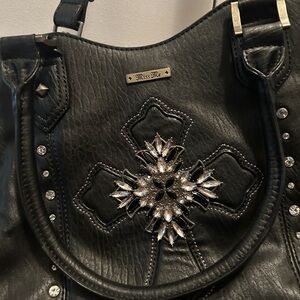 Miss Me black purse NEW CONDITION worth the $$. You won’t regret this buy